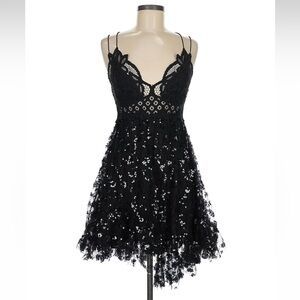 Sz M Free People One gorgeous black sequin and embroidered dress.